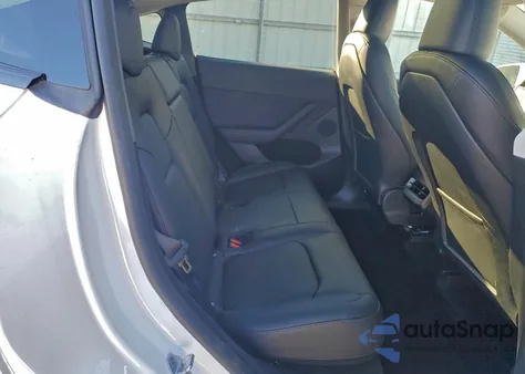 2024 Tesla Model Y from USA, damaged, VIN 7SAYGDED1RF182598